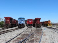 An assortment of power in the west end of the shop tracks. From left to right AC4400's CP 9624 CEFX 1026 GP20ECO CP 2214 ES44AC CP 8954 and Quebec Gatineau GP38 2009.