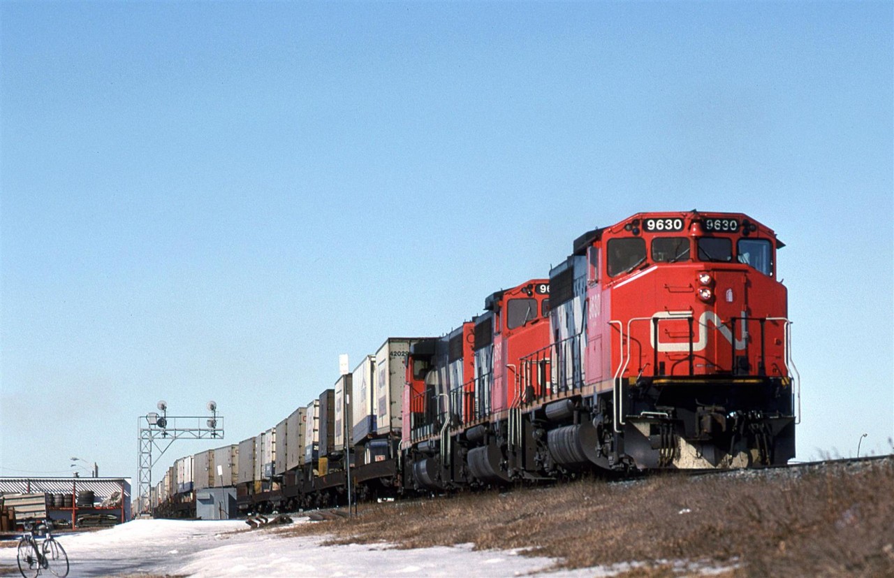 Train 214 is leaving the Calder Yard bypass track, and entering CTC track that will become the Wainwright Sub in about another 300 meters. This train was pretty dependable, and was easily identified by its TOFC traffic.
My means of transportation is seen at lower left.