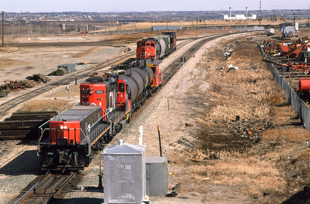 This transfer job is likely only going a short distance down the Camrose Sub, and will clear up in a siding  so that #820 can continue southward. It sure looks like a light day for #820. They won't be bring much back either given that they only have one 2000 horsepower unit.