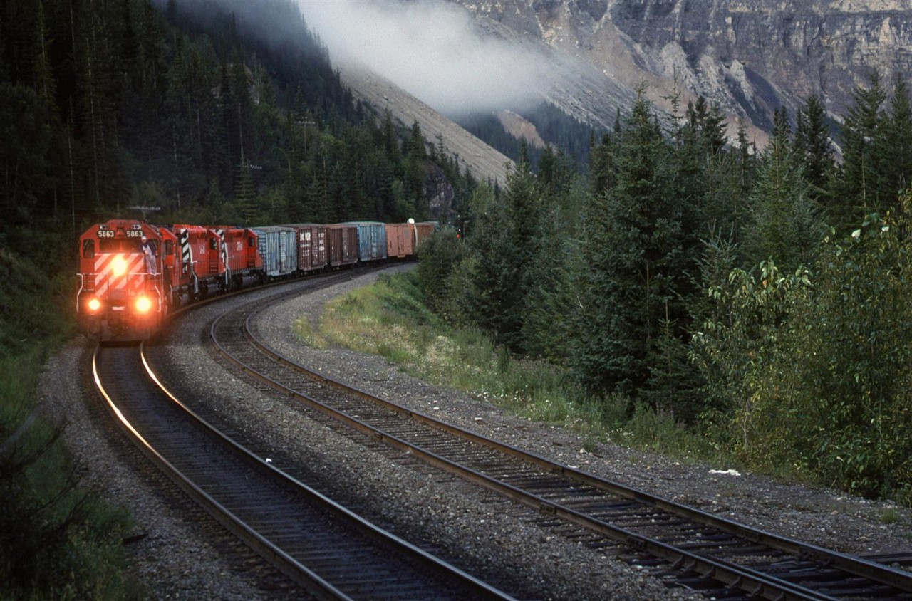 A westbound manifest holds the main but will have to stop before the end of Yoho so that an eastbound may get by on the siding.