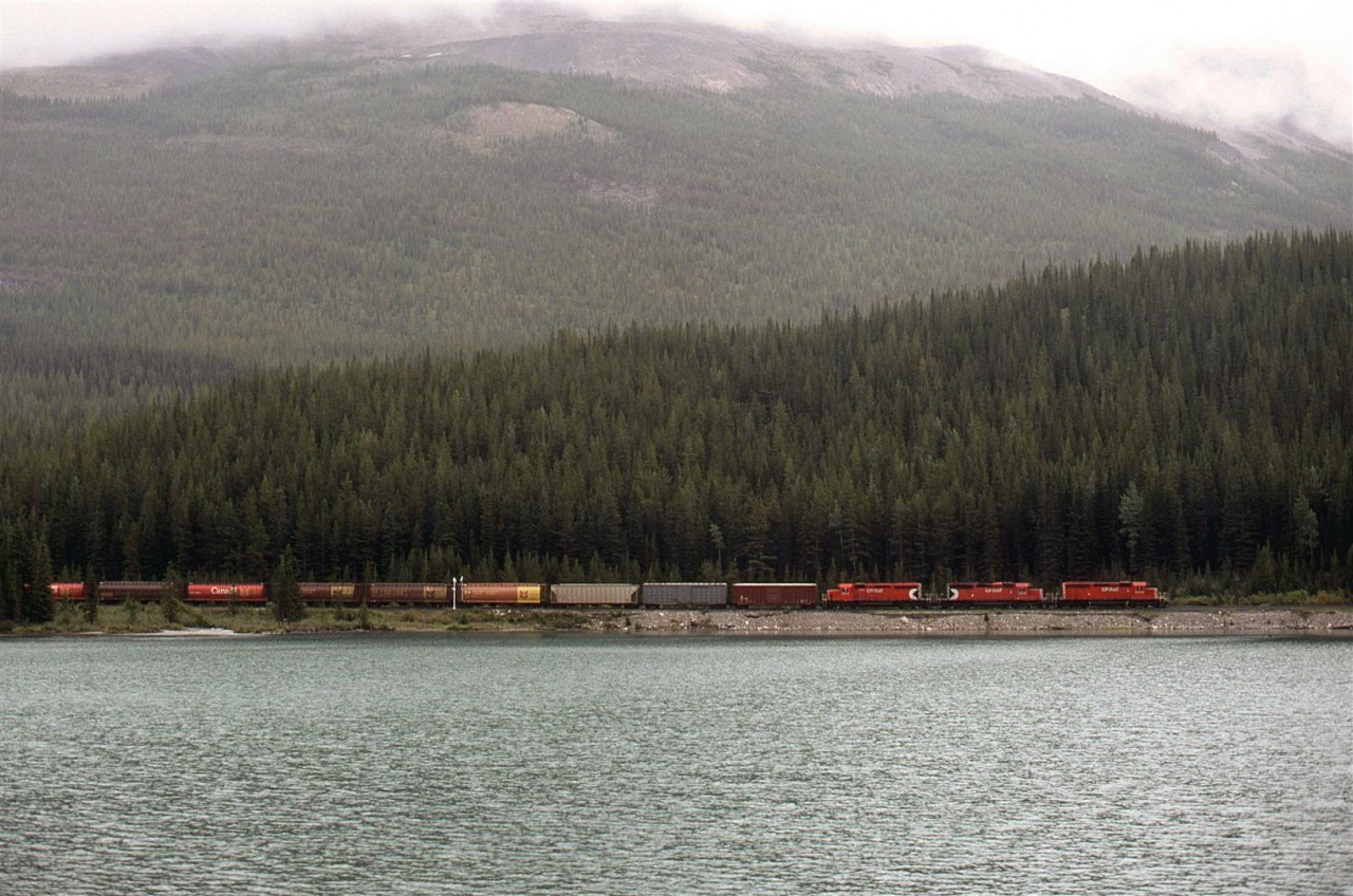 OK, Hector does not exist at the time of the photo, but at one time, it was Hector. We are looking across Wapta Lake, just before the 2.2% grade begins through the west slope of Kicking Horse Pass. 
There is a rather nice waterfall just to the left, out of frame, that would be nice to work into a photo. I just never had the opportunity. That valley that leads to the right goes to the famous Lake O'Hara area.