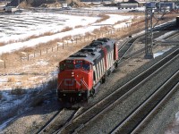 A couple cowled SD50's are about to couple onto their empty sulphur train at the west end of Bissell Yard. After their air test, they will back the train to the east end of the yard to Union Junction. From there, they will proceed forward up the Sangudo Sub all the way to Kaybob for loading.