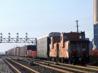 This is likely the same CP train that I saw the previous day - a trackage rights situation to allow access to the Oakville Yard and Ford plant seen in the background.