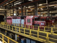 Barely sporting the ST. Lawrence & Hudson scheme given to it in December 1996, SD40-2 5615 shows signs of the CP Rail dual flag scheme appearing in it's fading paint. It has been sold and awaits the scrappers torch.