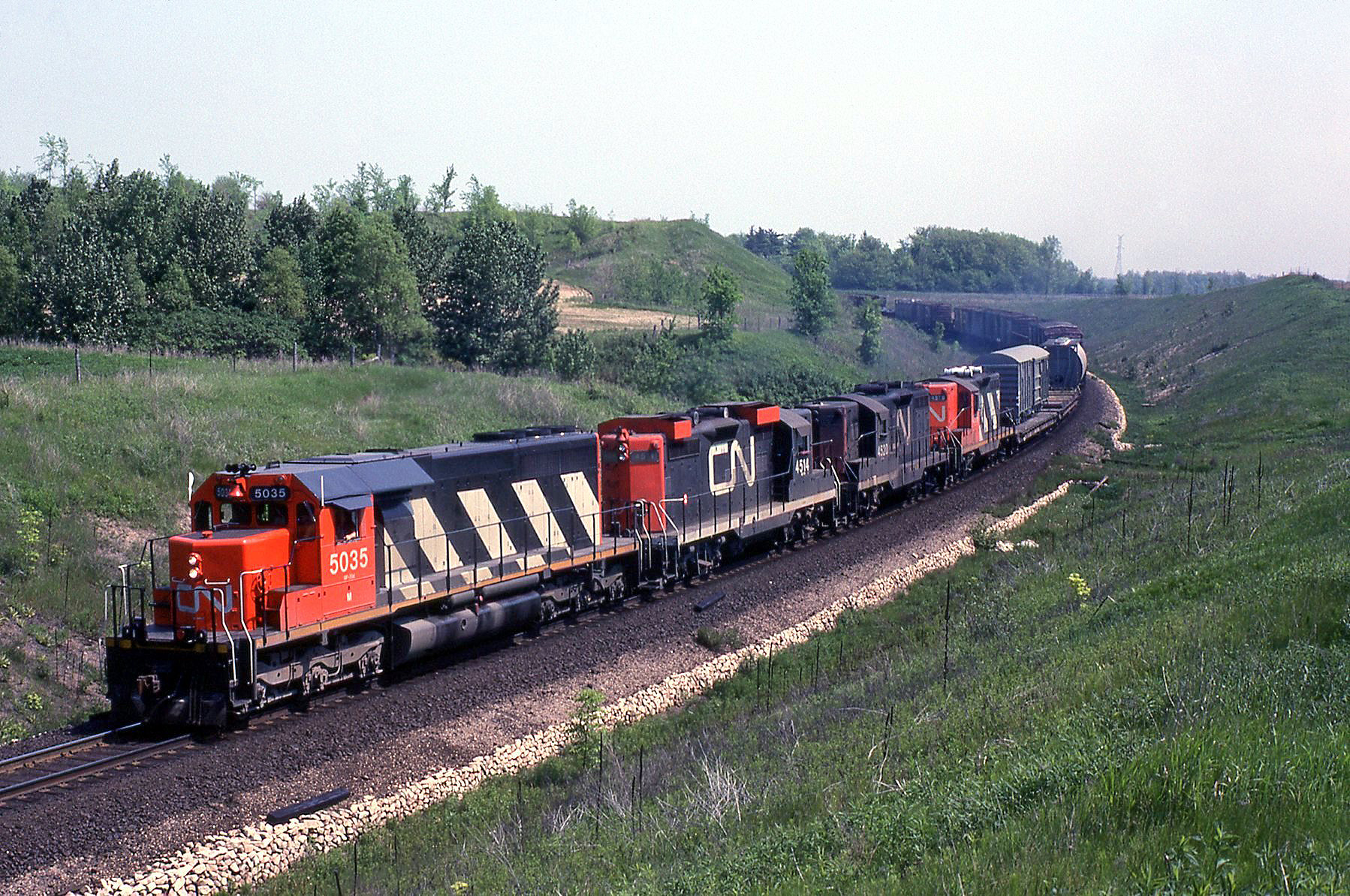 Railpictures.ca - Bill Thomson Photo: CN SD40 5035 leads GP9′s