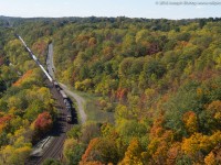 CN 394 glides downgrade through Dundas as fall colours begin to show from the peak.  We had just made it to the peak when I noticed a headlight come into view making for perfect timing...I had a hard time convincing my hiking buddy that I didn't know the train was coming.  I don't think she believed me!