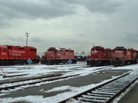 Only 4 axle power occupied the shop's west end on this day. GP38-2 3041, GP9u 8245 in very faded STL&H colors, GP9u 1598 1516 and 8238.