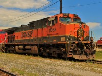 Pooled oil train power pulls into the east end of the yard service tracks at Agincourt.