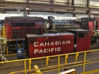 Whenever a locomotive requires heavy repairs the engine hood is removed to allow access to large components such as an alternator or complete engine change out. Here 9818 sits ready to go for engine work.