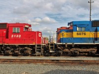 CP GP38-2 nose to nose with ex CP SD40-2 5557 now DME 6076. This is a good way to compare 2 & 3 axle trucks side by side.