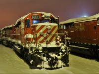 Still on the roster and hopeful to get back in service is CP SD40-2 6080 posing on track after a fresh snowfall.