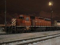 Mid November snow and conductor's side ground light helps to highlight 5708 on this crisp night.