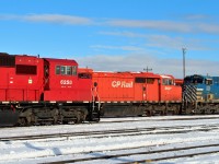 Two different EMD wide cab models CP 6258 an SD60M and CP 9001 SD40-2F pose just east of the servicing tracks.