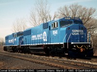 Conrail SD60M's #5541 and 5543 stretch their legs on the GMDD test track in London, Ontario back on March 27, 1993.  It was always a crap shoot heading to the test track, but it was a ritual if you were going to London for the day.  Now it's just a faint memory recorded on film.....  Sad.....