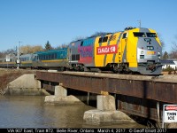 "Thin Ice"...... No worries of that today with the warm temps we've been having this winter!!  It's 9:24a.m. and VIA 907 is hauling ass as it speeds train #72 through Belle River on a beautiful March 4th day.