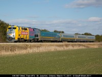 Halifax, Jonquiere, Guelph, and Edmonton adorn the Conductor's side of VIA 907, in it's "Canada 150" livery, as it hustles train #73 and a pure set of LRC cars through St. Joachim, Ontario on March 11, 2017.