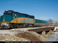 Today's VIA #73 didn't warrant any "Canada 150" wraps, probably because 72 and 71 both had one today, but the light was much too nice to pass on a shot.  The sign in the distance says "DANGER.  Thin Ice", but that had no effect on #73 as he was a couple minutes early today as we see him rolling over the frozen "Belle River" in Belle River, Ontario.