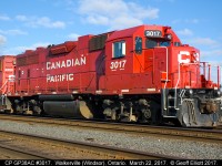 CP GP38AC #3017 rests as part of an e/b lift to made from the yard in Walkerville (Windsor), Ontario.