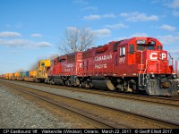 An interesting lift to made later in the day site in Walkerville yard, just outside of Windsor.  The lift is made up of CP GP38AC #3017, GP20C-eco #2259, caboose #422988, and a large cut of loaded well cars.  The caboose has been going back and forth to the U.S. on transfers for a while as a shoving platform but it appears that it must have served it's purpose if it's leaving town.  Not very often do you see a caboose with well cars in this day and age.