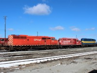 A nice surprise came to view when I passed by the east end of the shop. Overnight moves resulted in SD40-2F 9001 GP9u 1533 and SD40-2 SSRX 6076 being left together basking in the sun.