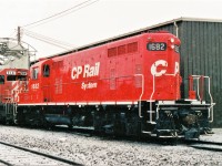 So long Multimark... GP7u 1682 arrives at Agincourt with the new at the time CP Rail System paint scheme replacing it's older Multimark one.