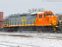 Freshly rebuilt QNSL 314 trails third out on CN 148 through Brantford Ontario.