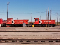 A pair of slug daughters at the old Agincourt fueling stand. The 1024 (numbered in 1996) was built in 1959 as SW1200RS #8130 renumbered 1275 in 1985. The 1011 (numbered in 1996) was even older having been built in 1950 as SW8 6701. The only reason they are both coupled together is that the 1011 got sideswiped and was set off for repair. There is yellow caution tape at the front grab irons/steps. Both units were retired in 2013 and scrapped.