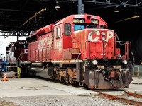 Looking a little worse for wear CP 5857 sits ahead of ex SOO LINE 6614 another SD40-2 in the safe to travel inspection line.