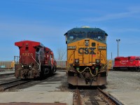 A DC traction motor equipped CSX GE ES40DC finds itself at the east end of the shop tracks. To it's left is a stored AC4400 with a stored SD40-2 behind it.