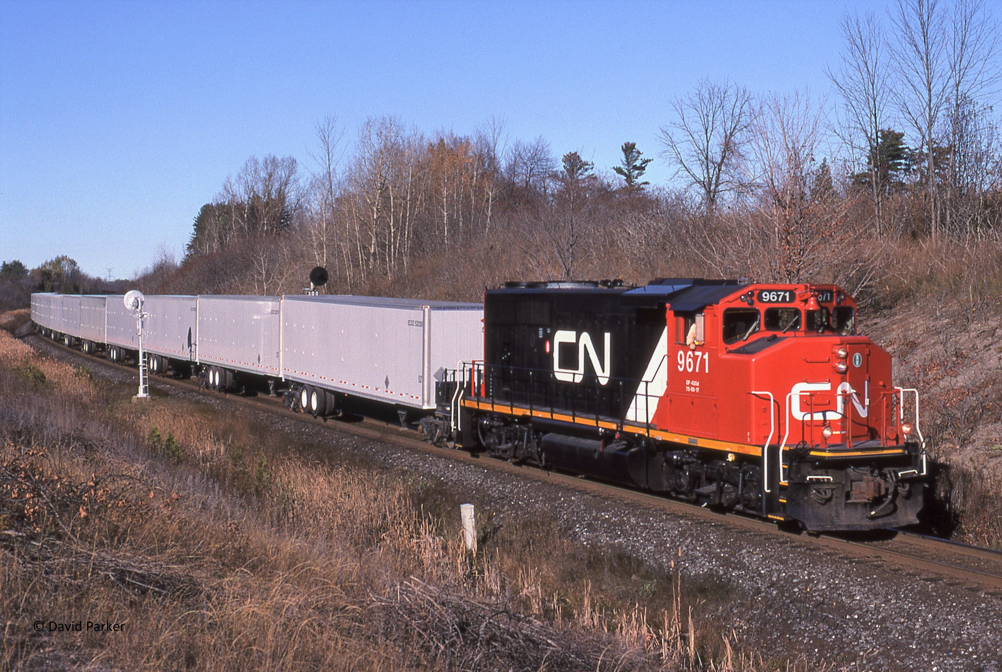 Railpictures.ca - David J Parker Photo: A nice clean CN 9671 leads train  145 as it splits the signals at Mile 30 (Scotch Block) Halton Sub