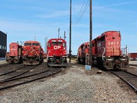 Four tracks of stored locos at the south end of the shop comprising of a clean looking former SOO SD40-2 hump unit CP 6607. The 5878 has been sold while the remaining SD40-2's will most likely be put up for sale soon. Most of the 9500 series GE's will be stripped of good usable parts with possibly 30 being re-manufactured.