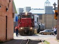 In a scene that has since been drastically altered due to the addition of the new LRT system, Goderich-Exeter Railway train X580 is seen approaching King Street in uptown Waterloo, Ontario with GEXR GP38AC 3835 and LLPX GP38AC 2210. The train is heading back to Kitchener from Elmira on the Waterloo Spur. 