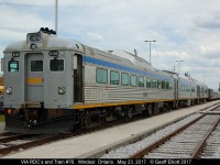 A trio of rebuilt VIA RDC's are front and center at Walkerville (Windsor) Station today as VIA has brought the trio to Windsor as part of the Memorial Cup Tournament being held at the Windsor WFCU Center.  The RDC's are being used to shuttle school children from the station to the WFCU to view a display explaining the history and meaning behind the Memorial Cup.  In addition they teach the kids about railway safety along the way.  Great job by VIA in promoting this.  Behind the RDC's is VIA Train #76 getting ready to depart for Toronto at this time.