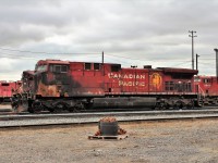 AC4400 CP 8646 suffering from some "facial damage" sits by the east end roadway.