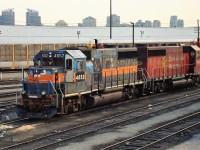 A pair of GP40-2's that were powering the "Oshawa Turn" are seen on a slow day for power at the shop's west end.