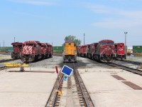 A variety of locomotive models on the east end shop tracks. From Left to right ES44AC CP 8931 SD40-2 CP 6080 with GP38-2 CP 3123 behind it SD70M UP 4442 AC4400's CP 8520 & CP 9662 with SD40-2 CP 5725 behind them GP20eco CP 2264.