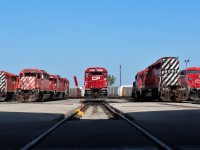 Getting some sunshine at the east end of the shop are a few stored SD40-2's including the 6067 that was in service this past winter on locals. Hopefully we'll see it again this winter even if it's just in snowplow service.