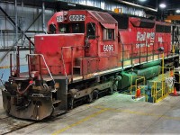 Dakota Minnesota & Eastern 6096 an ex SOO LINE and CP SD40 #6411 rests on the wheel lathe in plant 2. It was sold off earlier this year.