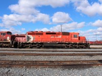 A snow plow service ready SD40-2 with blanked out inertial grill behind the cab (to prevent snow from being sucked in) and breather cut outs for the air compressor in the multi mark. Not sure if this one has been sold but being in the 5700 series it probably has.