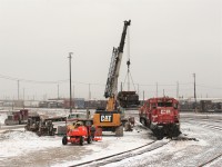  As the flurries fly CP 6623 is having it's engine lifted. It was trucked out, apparently to be rebuilt. 