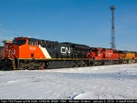 CP Transfer T40 power rests after returning to Windsor Yard on January 2, 2018.  With only Union Pacific, Norfolk Southern and CSX missing, half of North America's primary Railroads are represented today in a single consist with new CN ET44CW #3026, CP SD60 #6249, and BNSF ES44DC #7694.