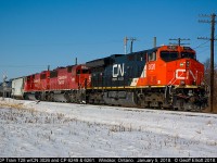 CP Train T28 has returned from the U.S. into Canada and is backing into Windsor Yard with CN ET44CW #3026 on point today.  CP SD60 #6249 remains part of the T28/T40 trio from January 2nd, but BNSF 7694 has been replaced with freshly rebuilt, former SOO Line, SD60M #6261.  Beautiful day to shoot, but after waiting here for about 5 minutes to shoot this guy, I could barely feel my fingers with the -25C windchill!!  BUT.......  It was totally worth it!