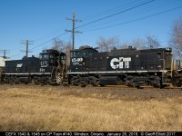 Trailing dead on CP Train #140 today were 2 ex-NS MP15DC's. Here is the pair, CEFX 1540 and 1545, as train 140 shoves back into Windsor Yard.  Personally I love the spray painted lettering on the side of 1545.  :-)