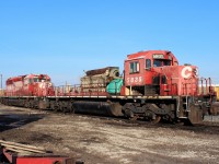 CP 5864 has been tacked on to 5835 so work on dismantling can begin. The 5835 has had it's batteries,air brake rack and a side of it's pilot removed in the ongoing recycling effort. The main alternator/generator has been covered (green tarp) and will be refurbished.