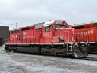 DME 6084 is parked at the east end of the shop awaiting it's transfer to the scrapper after starting out it's life as CP SD40 #5559. 