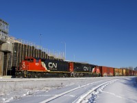 CN 429 from Bécancour is normally into Montreal in the middle of the night, but a very late departure for CN 430 from Montreal the day before put counterpart CN 429 into Montreal mid-morning. Here it's seen passing the Turcot Holding Spur with CN 9411, CN 5758 and 30 cars.