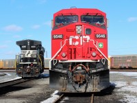 Fresh faced AC4400 from CP's first order of GE's contrasts with Norfolk Southern 4061. The NS unit is like CP's new 8100 series Locomotives an AC44C6M rebuilt from C40-9 DC powered #8865.