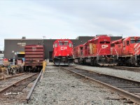 GP40-2 4614 and sold for scrap 6602 occupy tracks 1 and 2 west while to the left a boxcar is in the lowered materials department loading track.