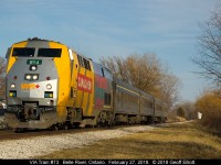 VIA 914 still sports it's "Canada 150" emblem as it speeds through Belle River, Ontario and will shortly arrive at it's final destination in Windsor.