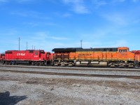 BNSF 3999 a tier 4 engined ET44C4 (only 4 of the 6 axles are powered) is parked with CP RAIL painted survivor  ex SOO GP38-2 4407.